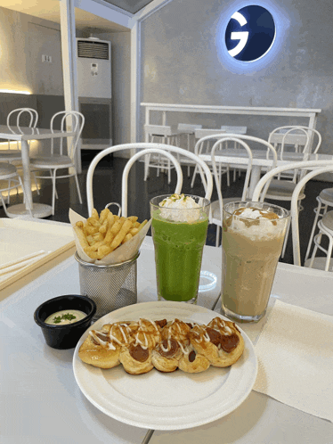 a restaurant with a sign that says ' g ' on the wall