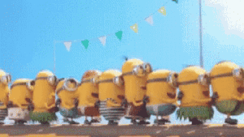 a group of minions are standing next to each other on the side of the road .