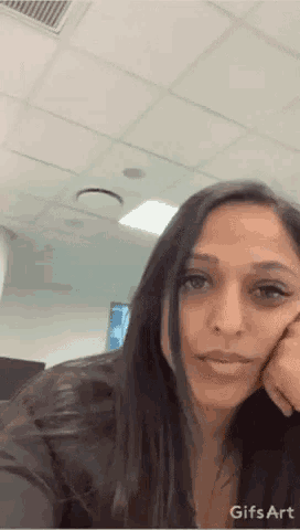 a woman 's face is shown in a gif that says gifs art at the bottom