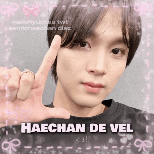 a picture of haechan de vel is surrounded by pink stars