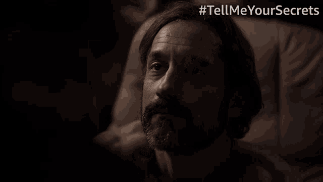 a man with a beard says " i 've always loved you " in a dark room
