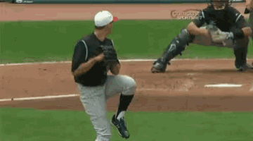 a baseball player wearing a number 33 jersey is throwing a ball