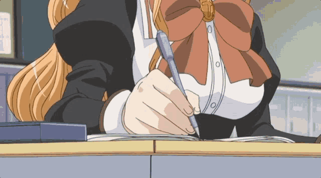 a girl is writing on a piece of paper with a pen in her hand