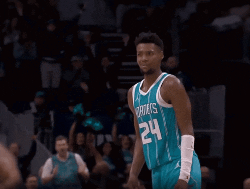 a basketball player wearing a jersey with the number 2 on it