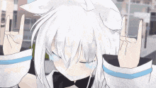 a white anime girl with a cat ear is making a rock sign with her hands .