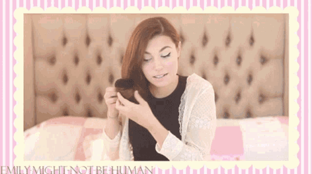emily might not be human is written on a pink and white striped background