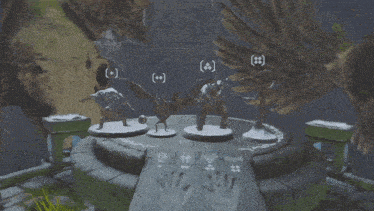 a statue of a man with a sword is surrounded by a statue of a woman with a sword