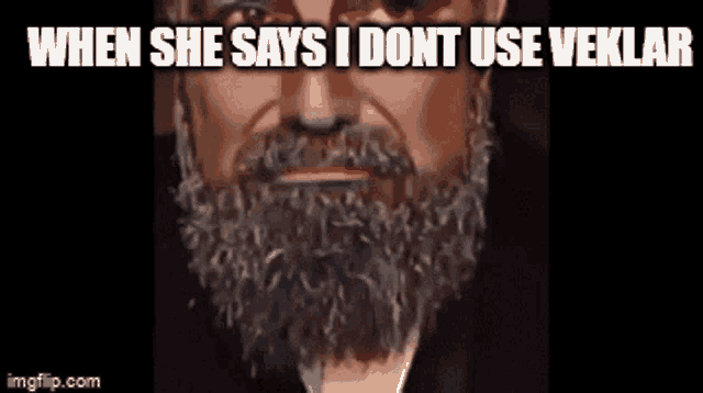 a man with a beard and a caption that says `` when she says i dont use veklar '' .