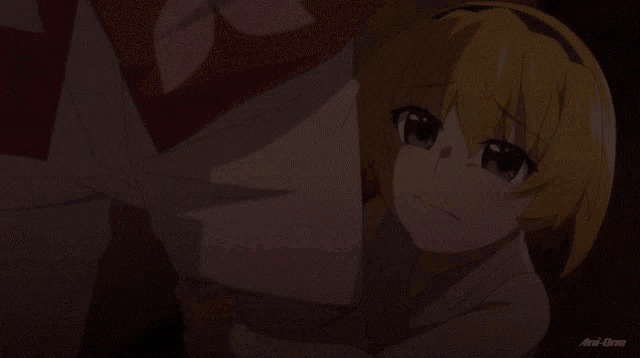 a close up of a girl 's face with an arrow pointing to the bottom left