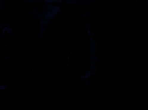 a blue light is shining on a black background