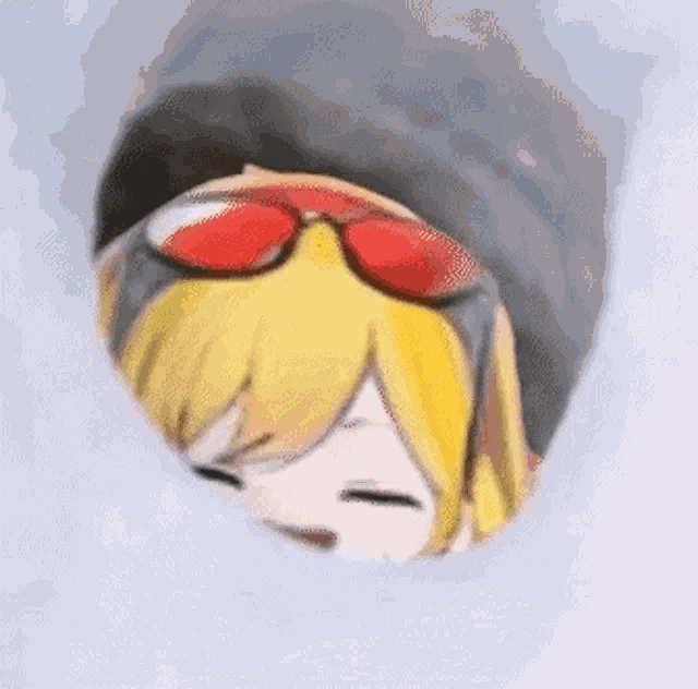 a close up of a person wearing sunglasses and a hat .