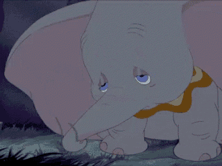 a cartoon elephant with a tear coming out of his nose