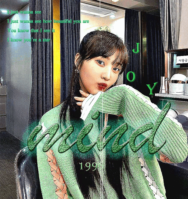 a girl in a green sweater with the word mind written on the bottom