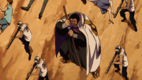 a man in a purple cape is surrounded by a group of men holding guns