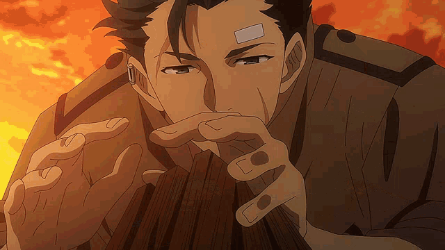 a man with a bandage on his forehead is looking at something