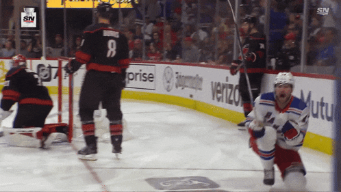 a hockey player with the number 8 on his back