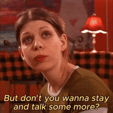 a woman in a green shirt says " but don t you wanna stay and talk some more "