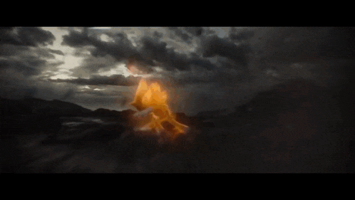 a sonic the hedgehog is running on a road with fire coming out of his mouth .