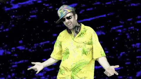a man wearing a hat and sunglasses is dancing in front of a purple background