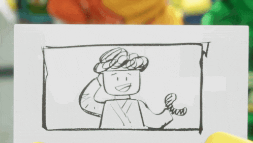 a close up of a drawing of a lego character on a piece of paper