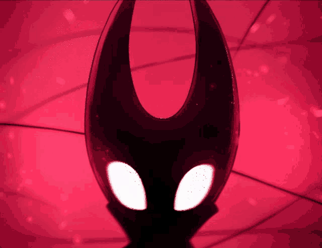 a red background with a silhouette of a horned monster
