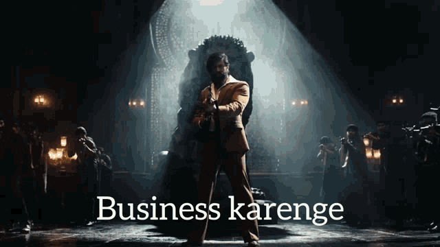 a man in a suit is standing in front of a throne with the words business karenge written below him