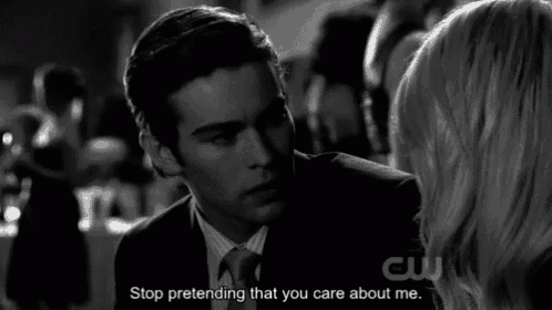 a man in a suit and tie is talking to a woman who says " stop pretending that you care about me "