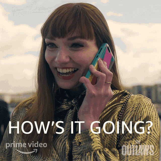 a woman is smiling while talking on a cell phone with the words how 's it going on the bottom
