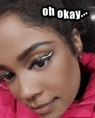 a close up of a woman 's face with the words " oh okay " above her