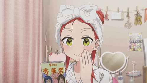 a girl with a towel on her head is holding a box that says 31