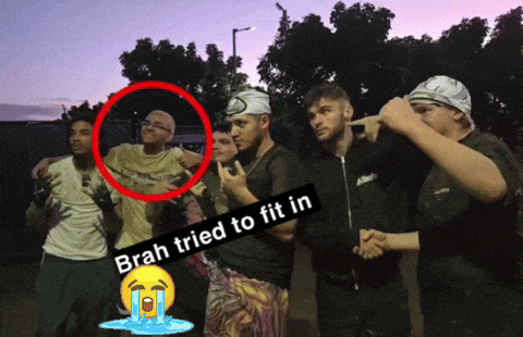 a group of young men are posing for a photo with a caption that says " brah tried to fit in "