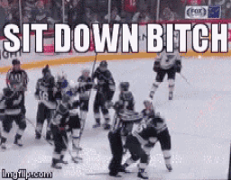 a hockey game is being played with the words sit down bitch above it