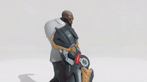 a man in a suit is standing next to a robot with a red x on the back of it