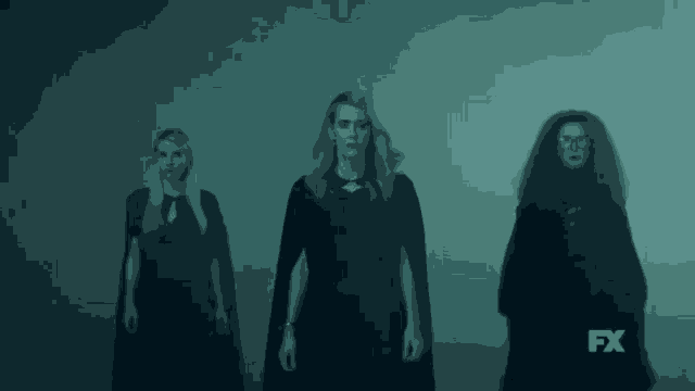 three women are standing next to each other and the fx logo is visible in the background