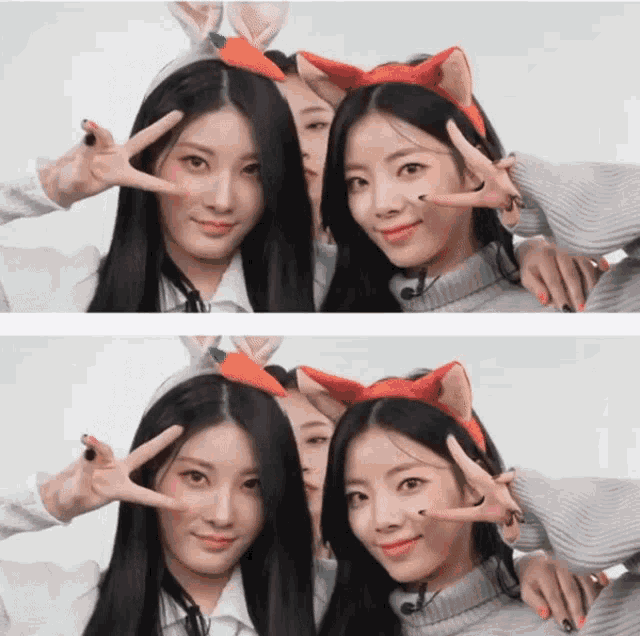 two girls wearing bunny ears and a carrot headband pose for a photo