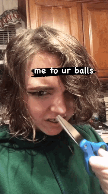 a woman is holding a pair of scissors in front of her face with the words me to ur balls written on it