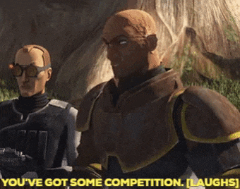 two men are standing next to each other and one of them is saying " you 've got some competition , laughs "
