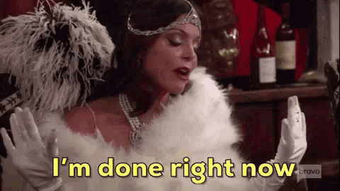 a woman in a flapper dress is saying i 'm done right now
