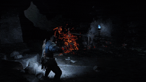 a video game shows a man with a sword and a monster with a torch