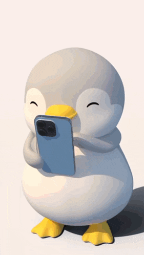a penguin is holding a cell phone in its beak