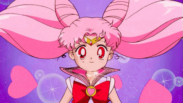 a girl with pink hair and a heart shaped necklace