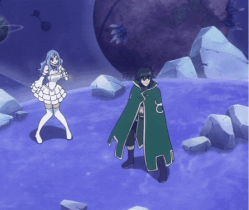 a girl in a white dress and a man in a green cape are standing next to each other