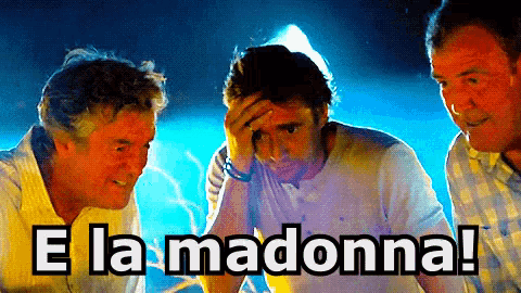 a group of men standing next to each other with the words " e la madonna " on the bottom right