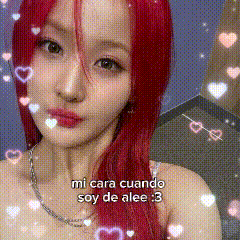 a woman with red hair is surrounded by hearts and says " mi cara cuando soy de alee 3 "
