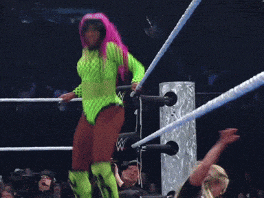 a woman in a neon green outfit is jumping in a ring
