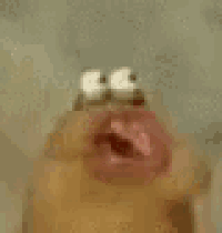 a close up of a person 's face with a cartoon character 's mouth open .
