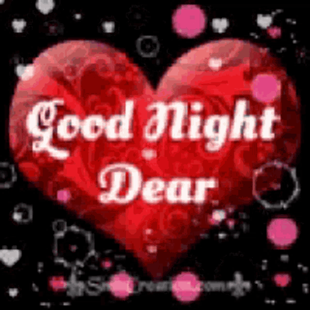a red heart with the words `` good night dear '' written inside of it .