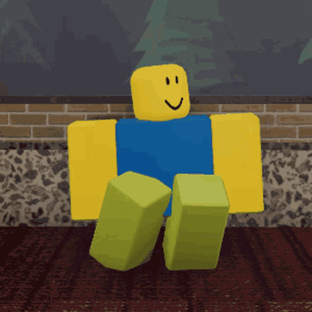 a roblox character with a smiley face and a blue shirt