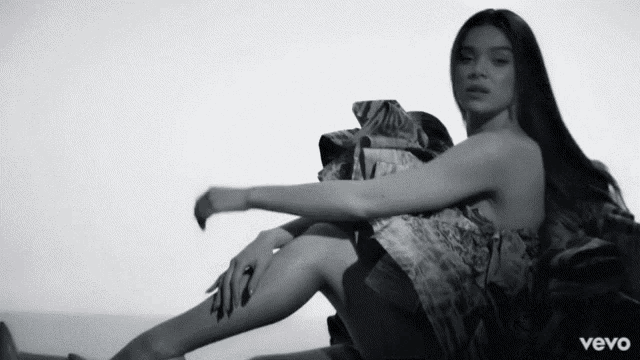 a black and white photo of a woman with the word vevo on the bottom right