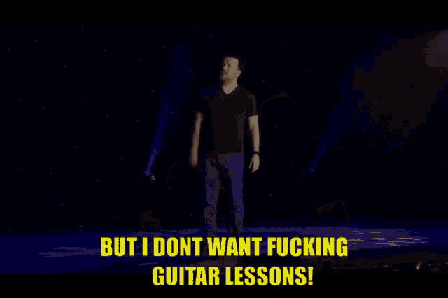 a man in a black shirt is saying but i dont want fucking guitar lessons